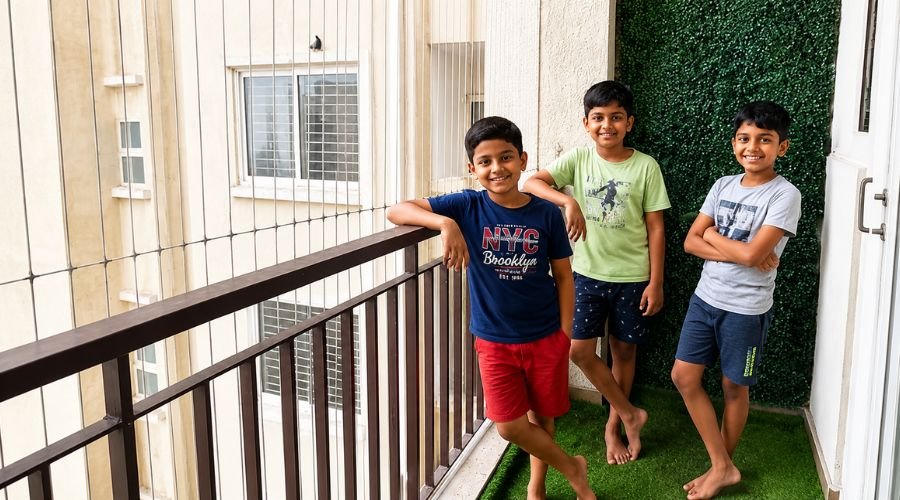 Child-safe invisible grills on high-rise balcony installed by ENB Enterprises