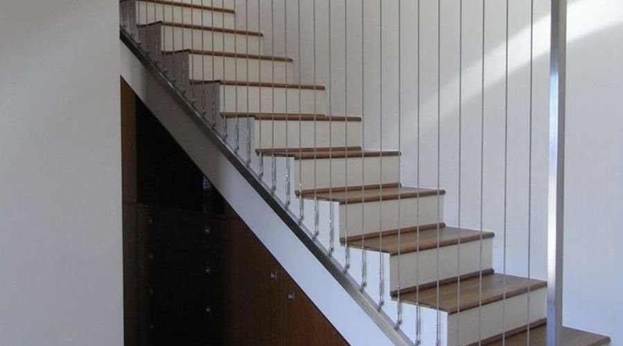 Modern staircase with transparent invisible grills providing safety and style in Chennai